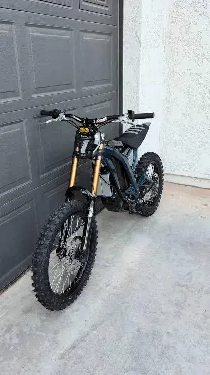 Electric dirt bike fitted with a gold 40s style front fork